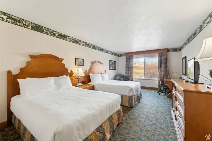 Bedroom featuring a textured ceiling