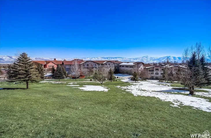 View of yard with a mountain view