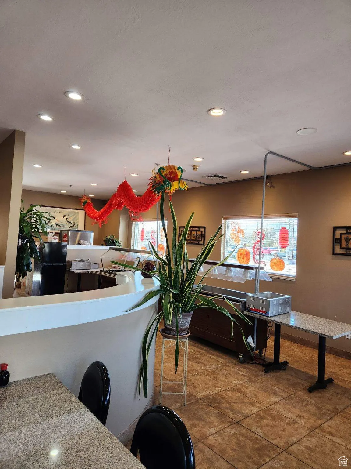 Dining space featuring tile patterned floors