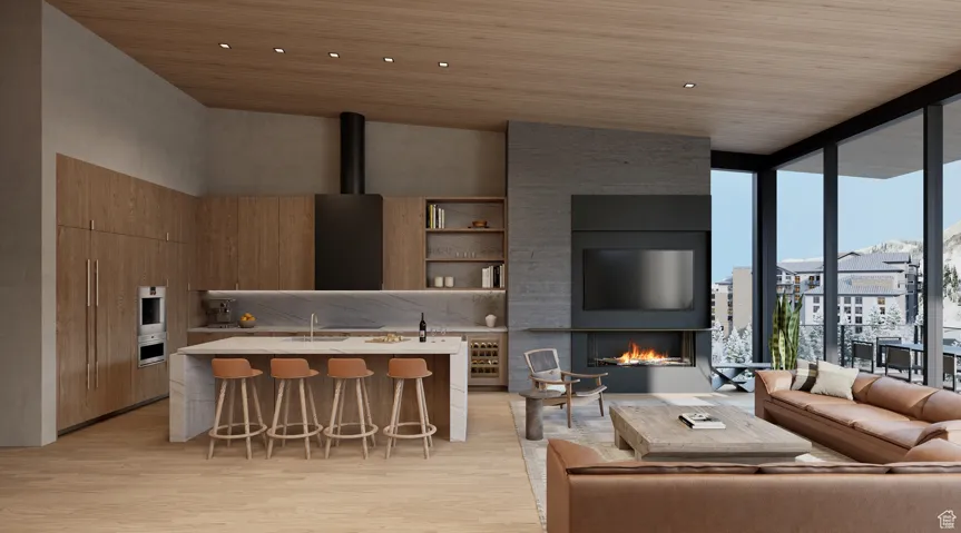 Living room featuring floor to ceiling windows, light hardwood / wood-style flooring, and wooden ceiling
