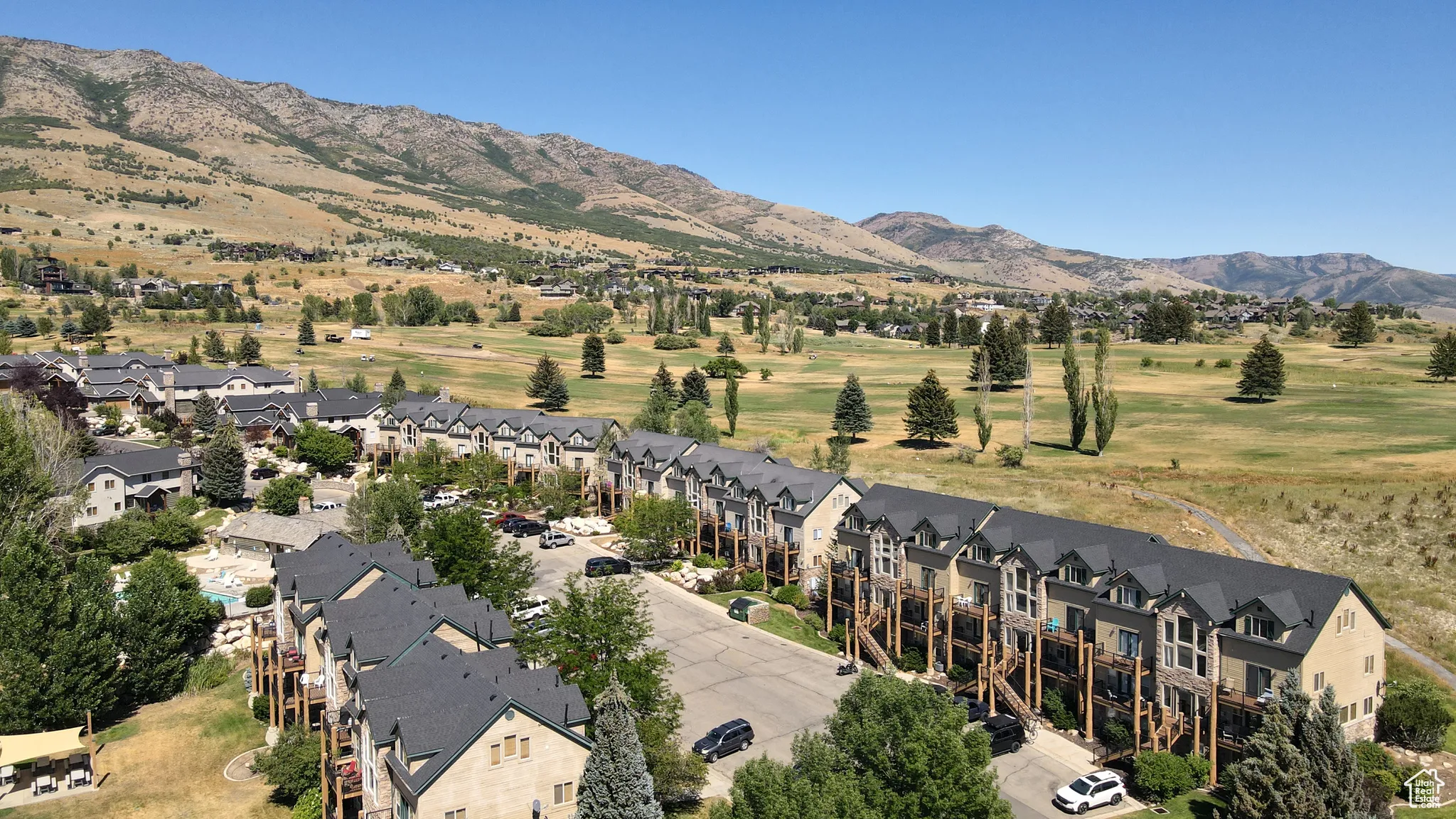 Aerial view of residential area with a mountain backdrop