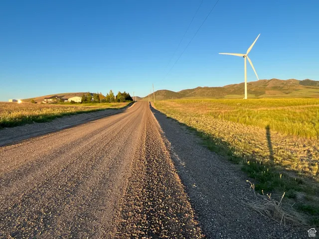 View of road featuring a mountain view and a rural view