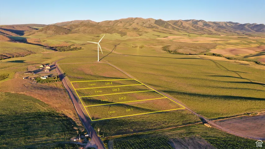 Drone / aerial view featuring a mountain view and a rural view