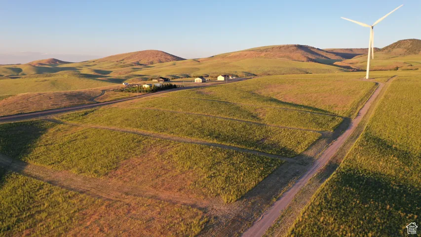 Drone / aerial view featuring a mountain view and a rural view