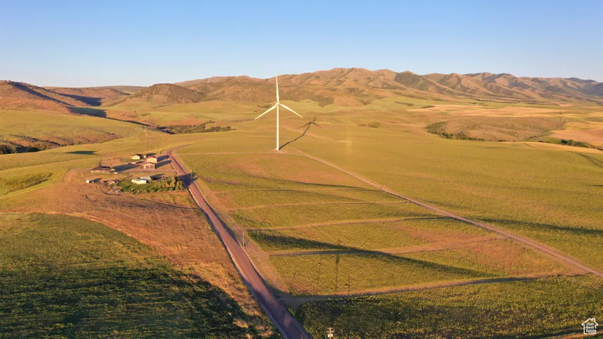 Birds eye view of property featuring a mountain view and a rural view