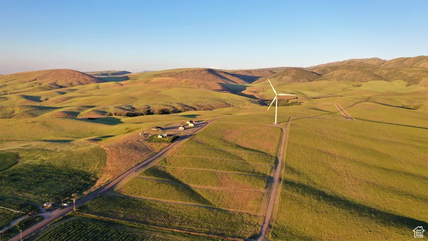Drone / aerial view with a mountain view and a rural view