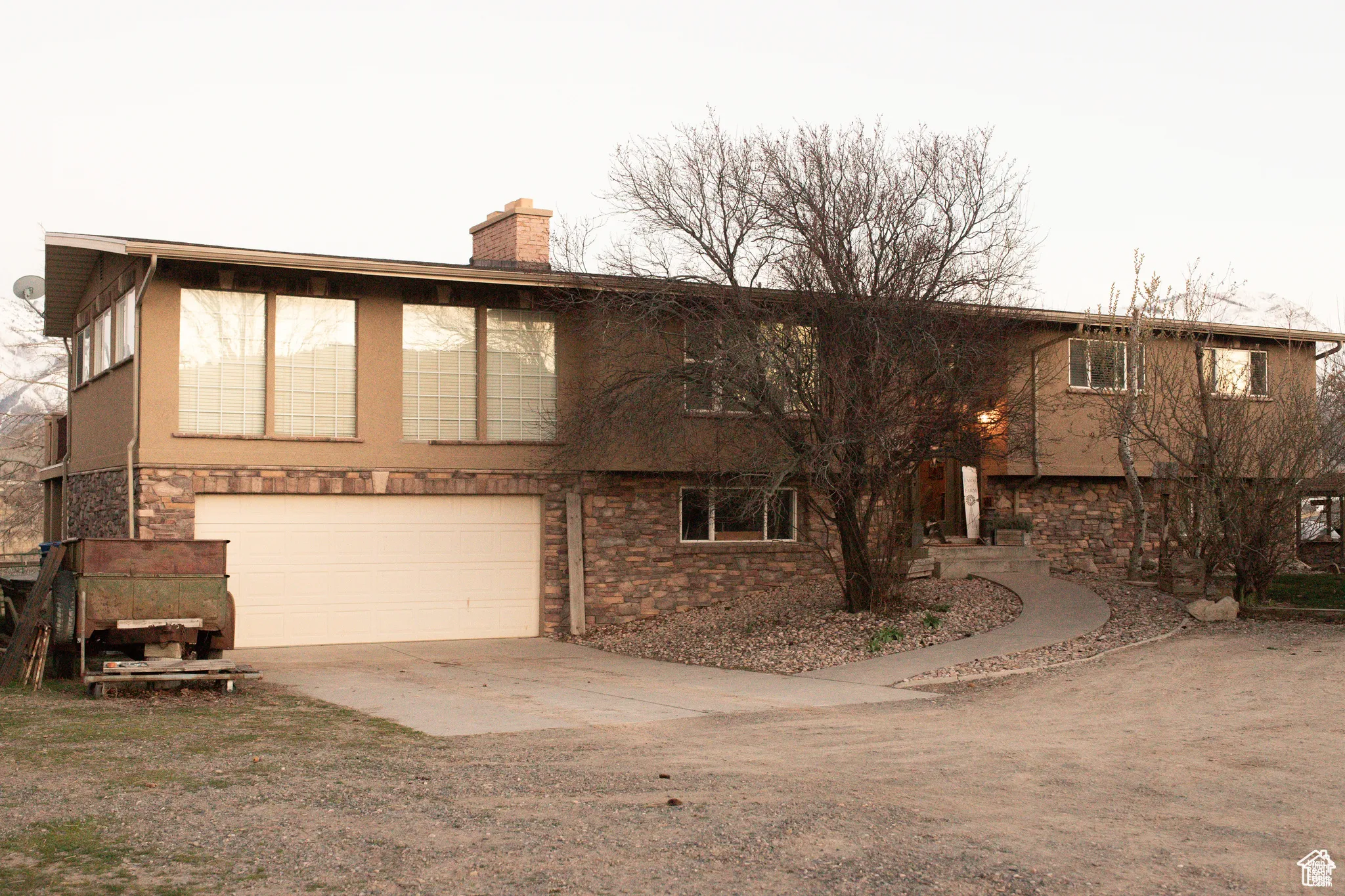 View of front of home featuring a garage