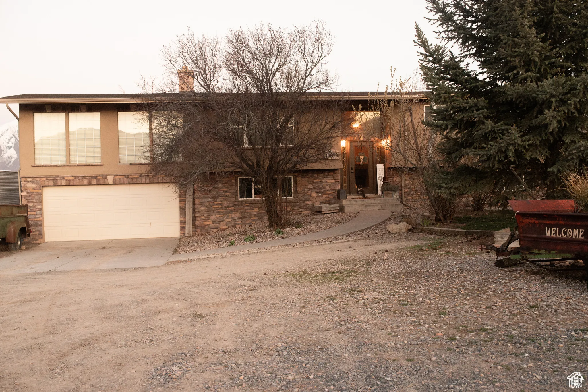 View of front of home featuring a garage