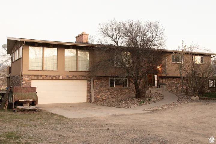 View of front of home featuring a garage