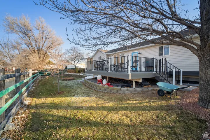 View of yard featuring a wooden deck