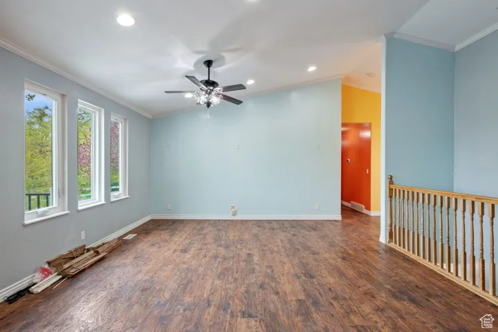 Empty room featuring recessed lighting, ceiling fan, wood finished floors, and baseboards