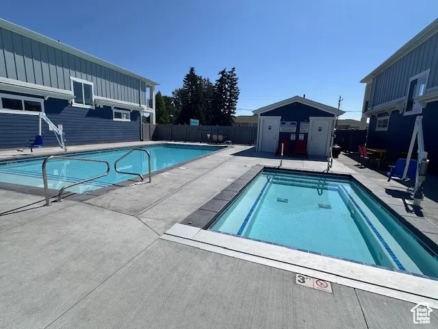 View of pool featuring a patio area