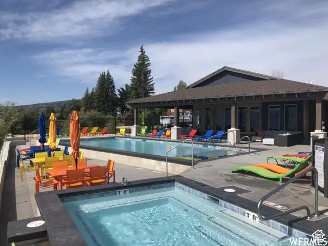 View of swimming pool featuring an outdoor hangout area and a patio