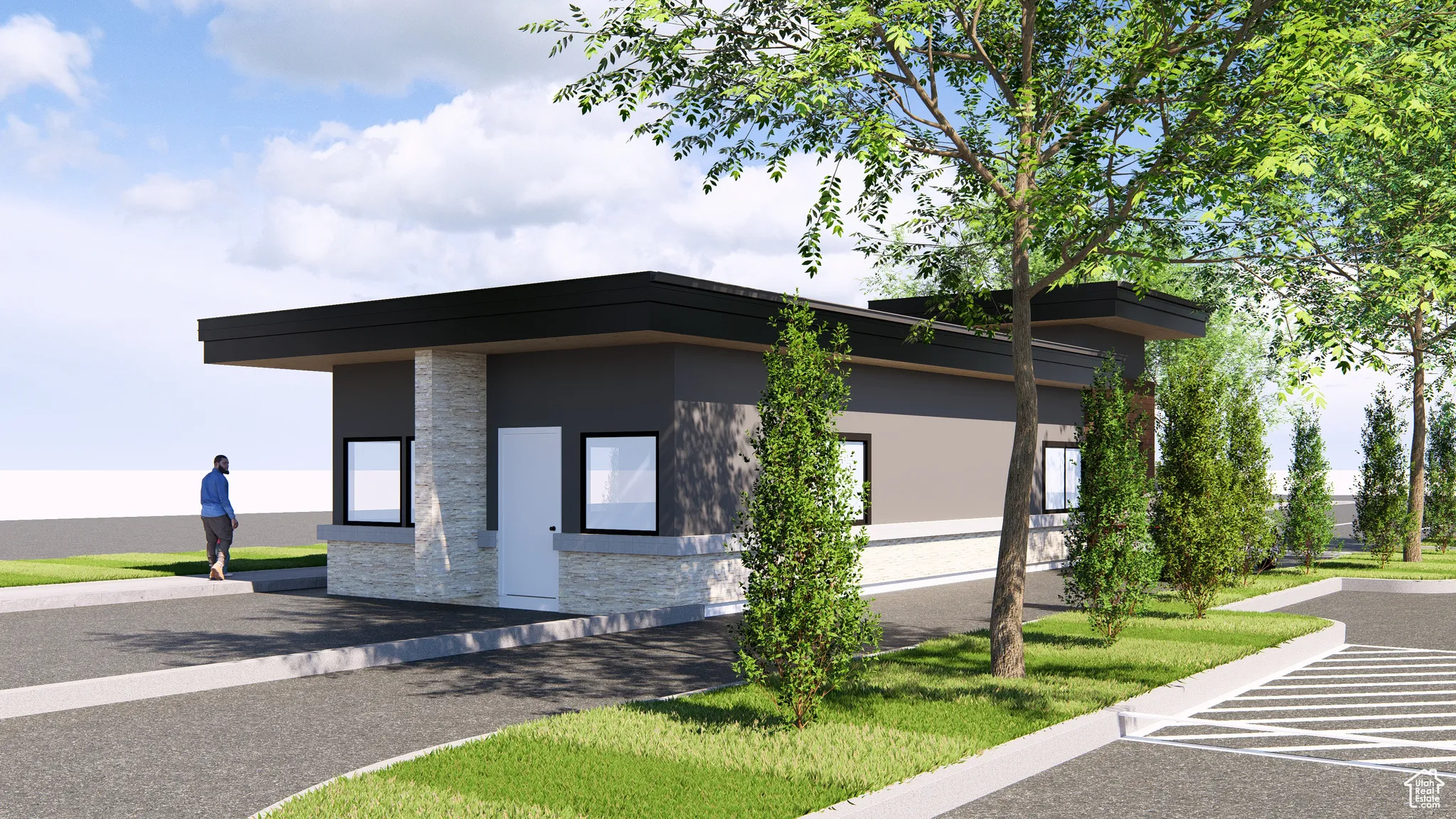 View of side of home featuring stucco siding, stone siding, and uncovered parking