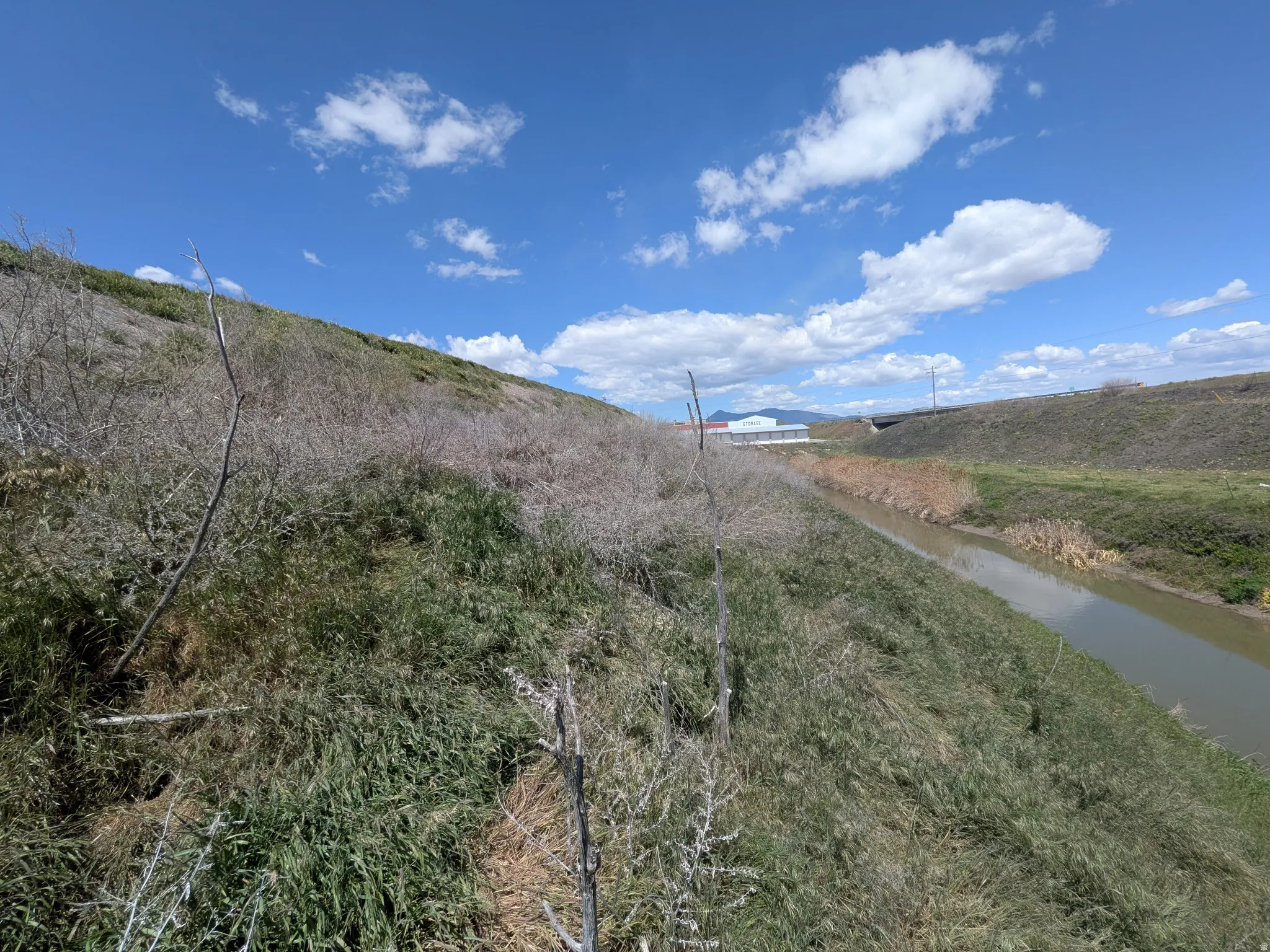 Mountain view featuring a nearby body of water