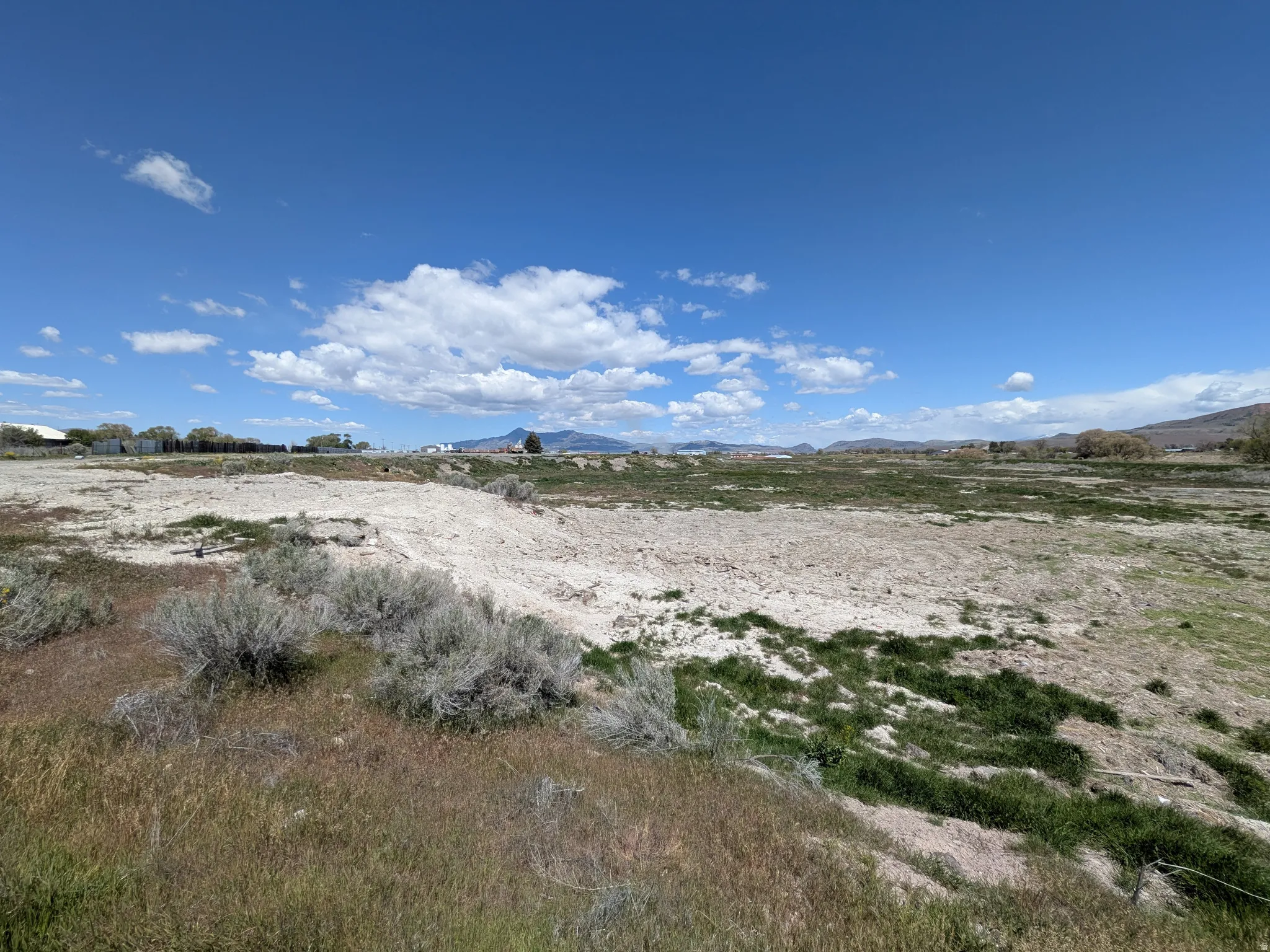 View of undeveloped land featuring a mountainous background