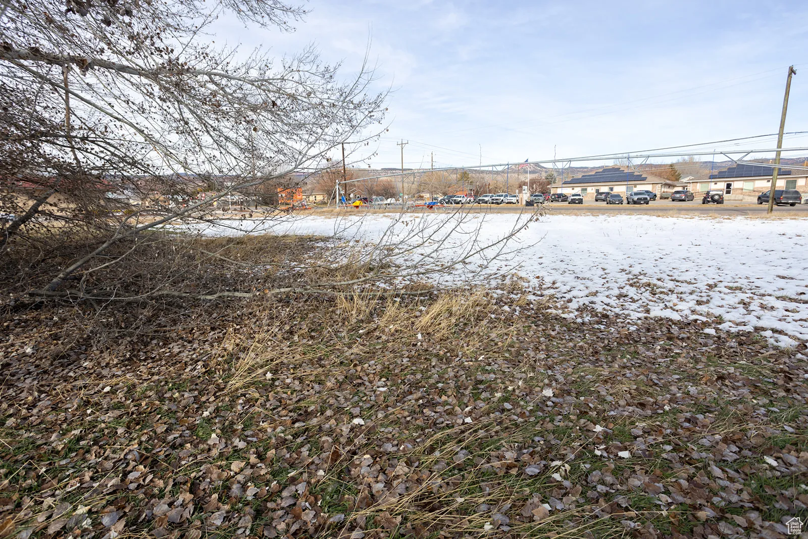 View of yard covered in snow
