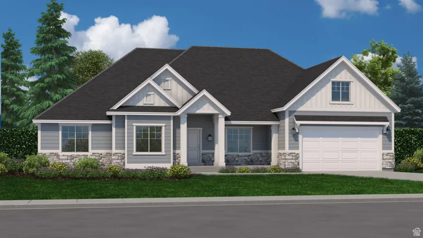 Craftsman-style house with a garage and a front lawn