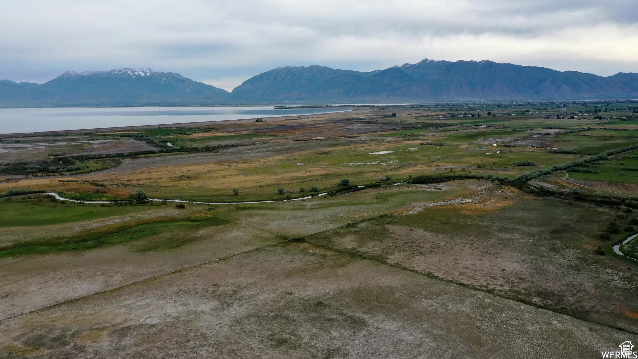 Mountain view featuring a water view