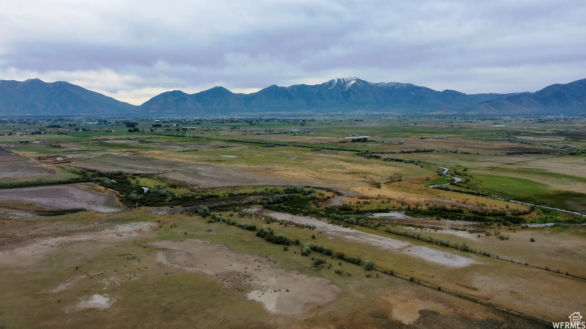 Property view of mountains with a rural view