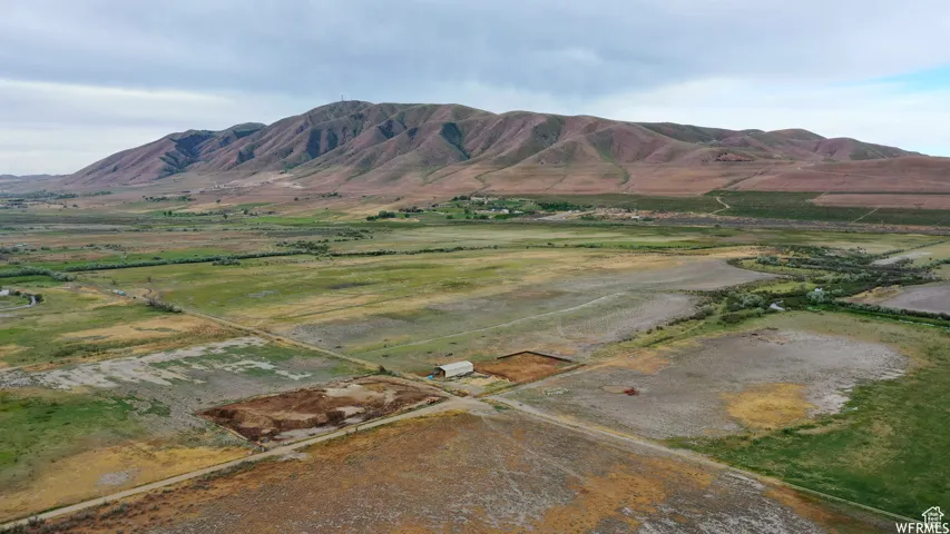 Property view of mountains featuring a rural view
