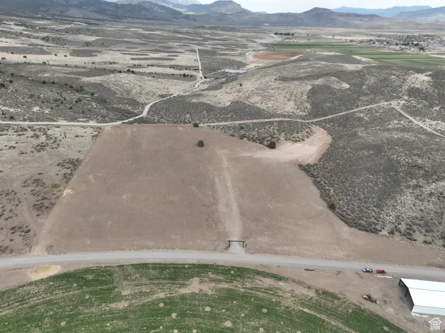 Drone / aerial view with a rural view and a mountain view