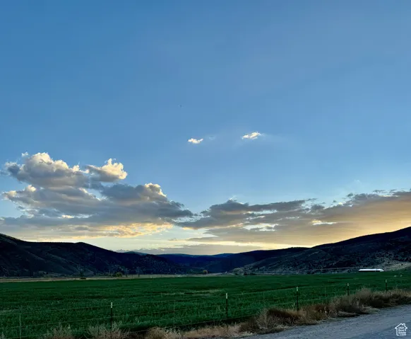 View of mountain feature with a rural view