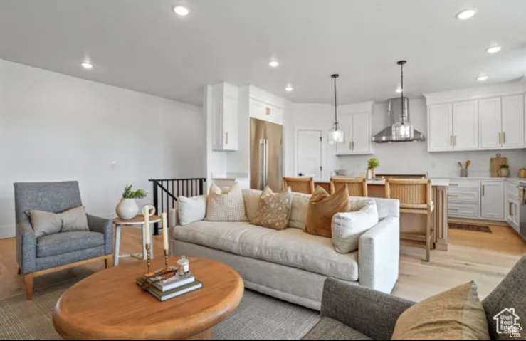 Living room with light wood-type flooring