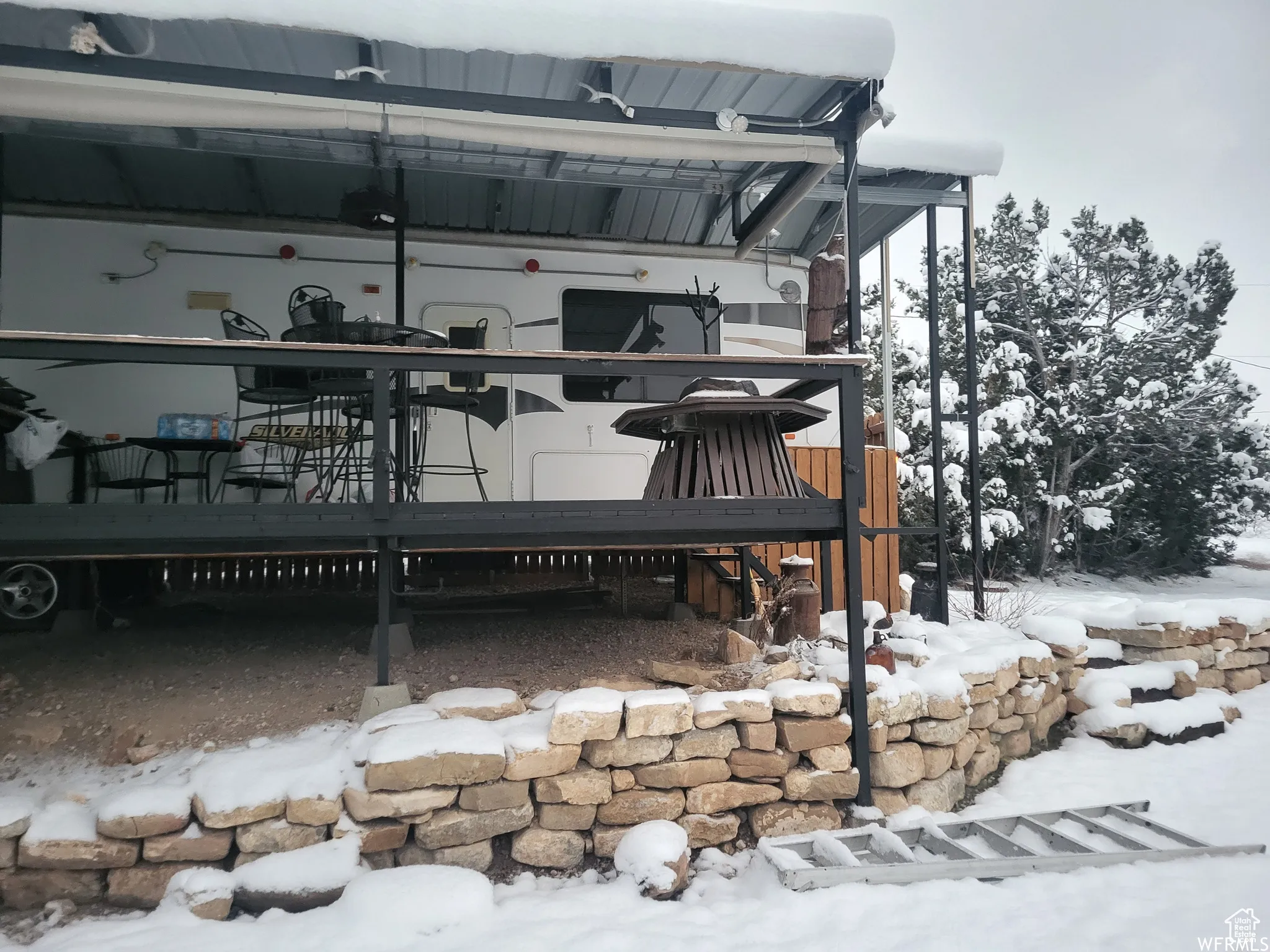 Exterior space with a wooden deck