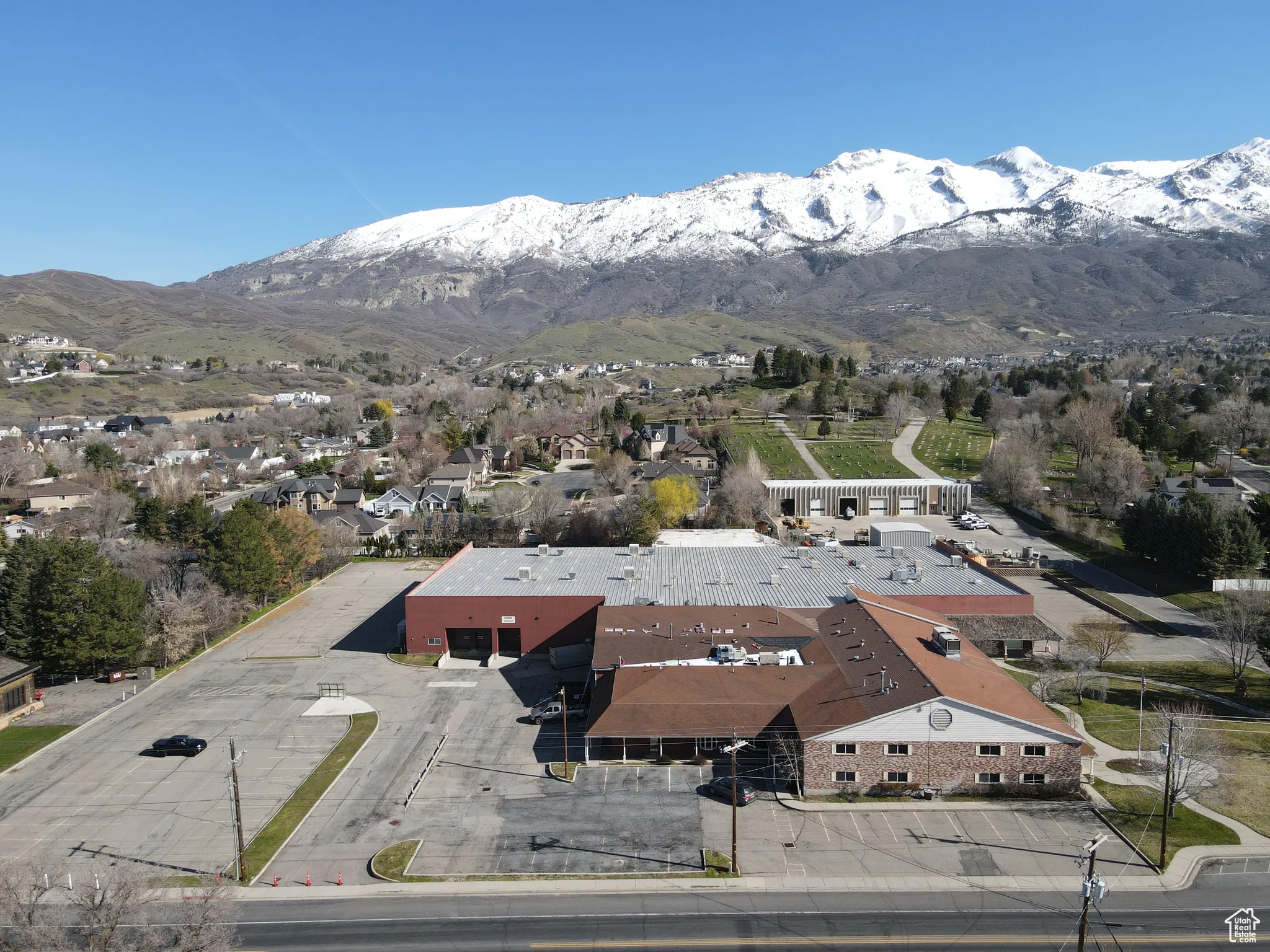 Birds eye view of property with a mountain view