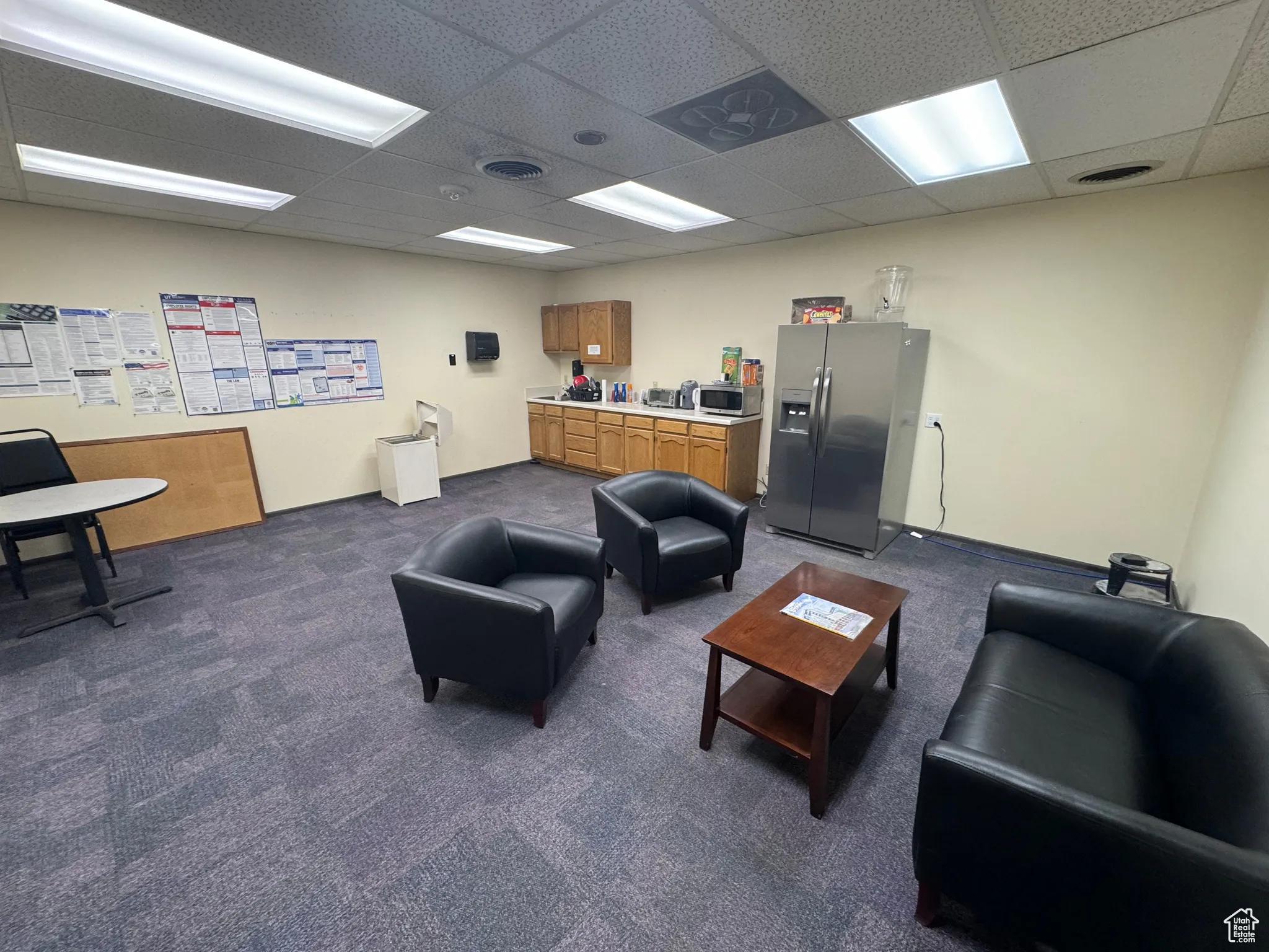 Interior space with a paneled ceiling
