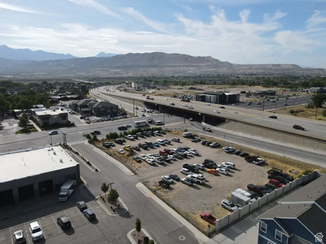 Birds eye view of property with a mountain view