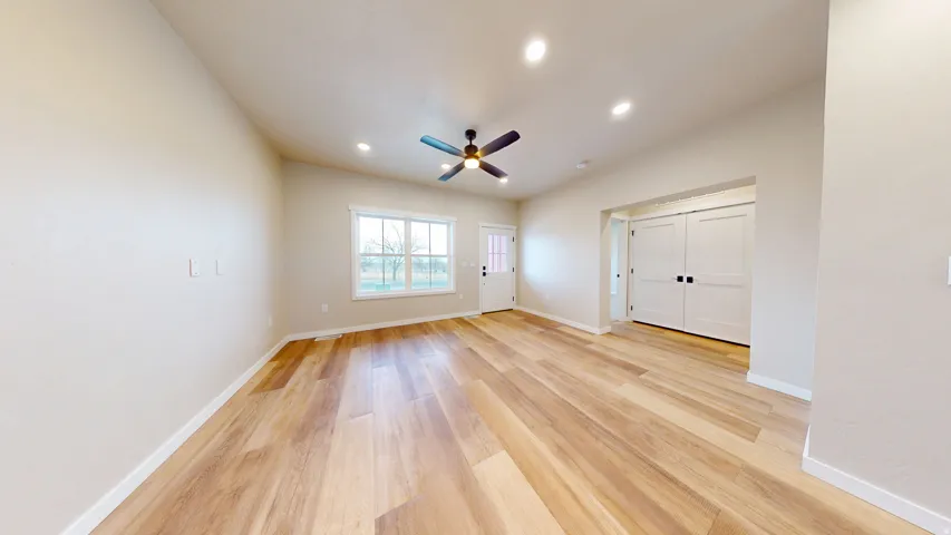 Spare room featuring recessed lighting, light wood-type flooring, and ceiling fan
