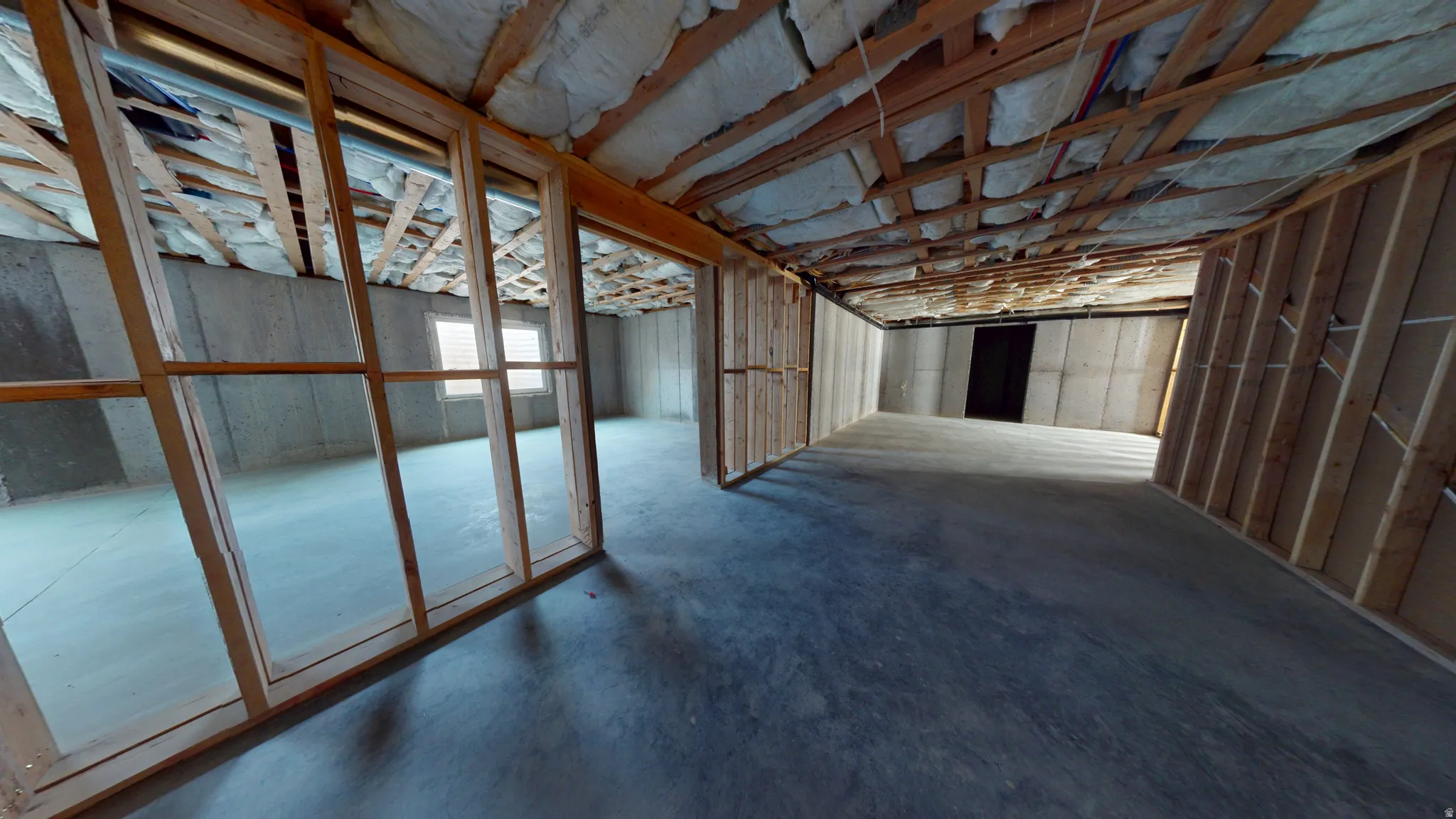 Miscellaneous room featuring concrete floors
