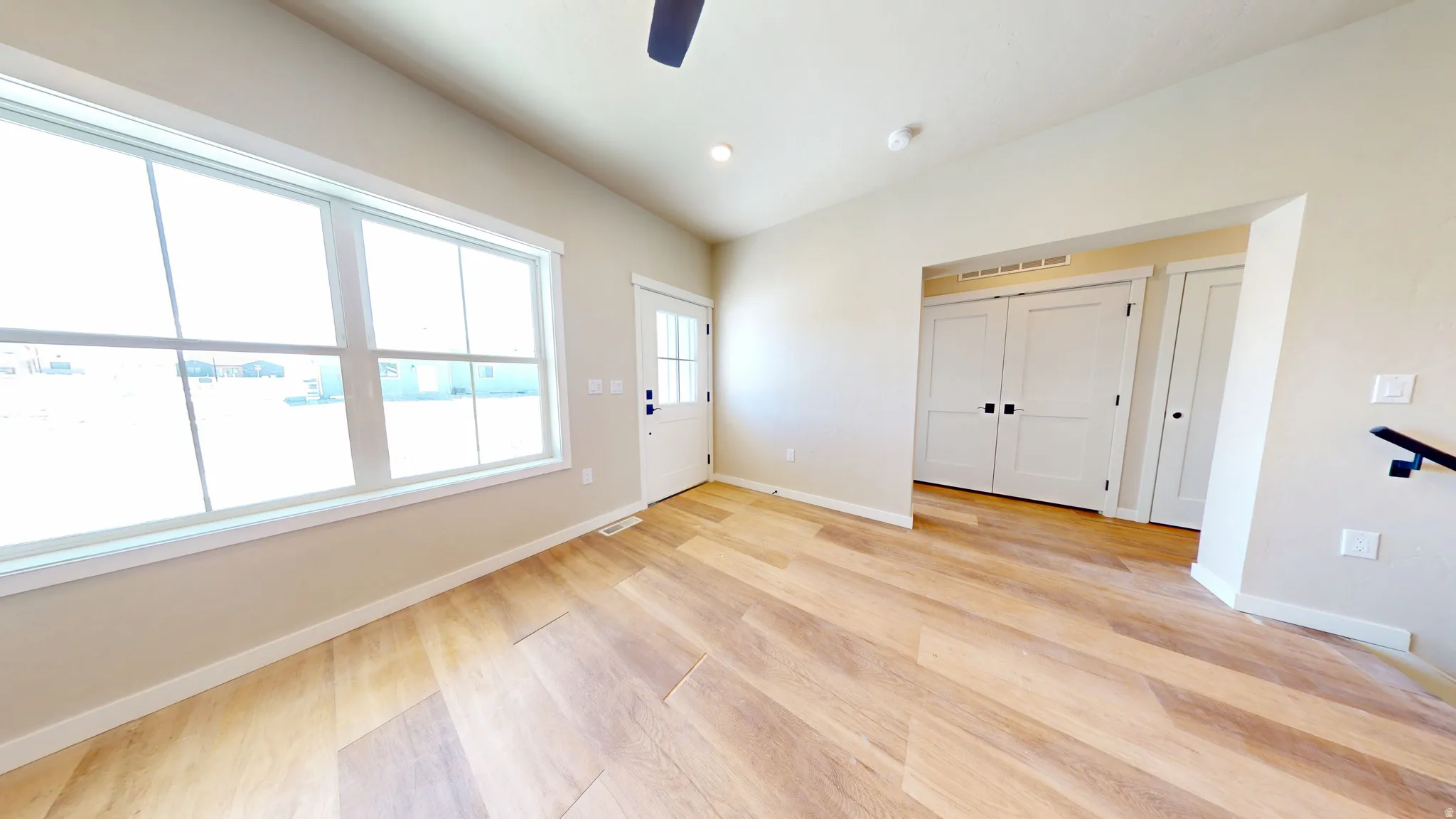Entryway featuring recessed lighting, light wood-style flooring, and ceiling fan