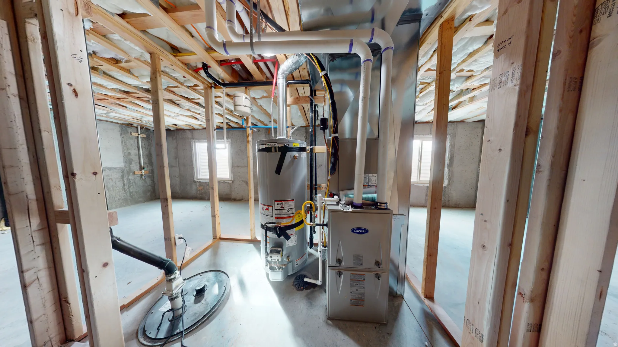 Utility room with strapped water heater