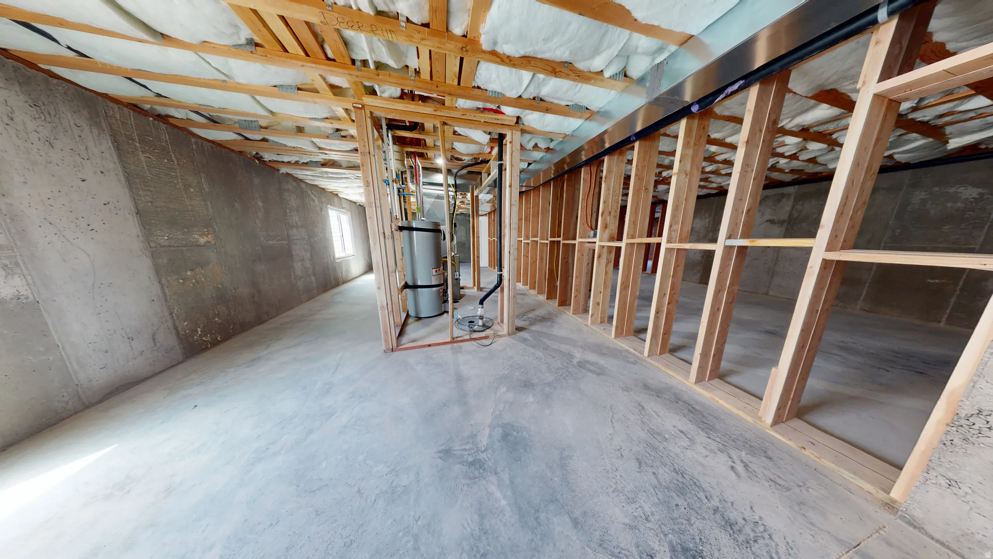 Unfinished below grade area with strapped water heater