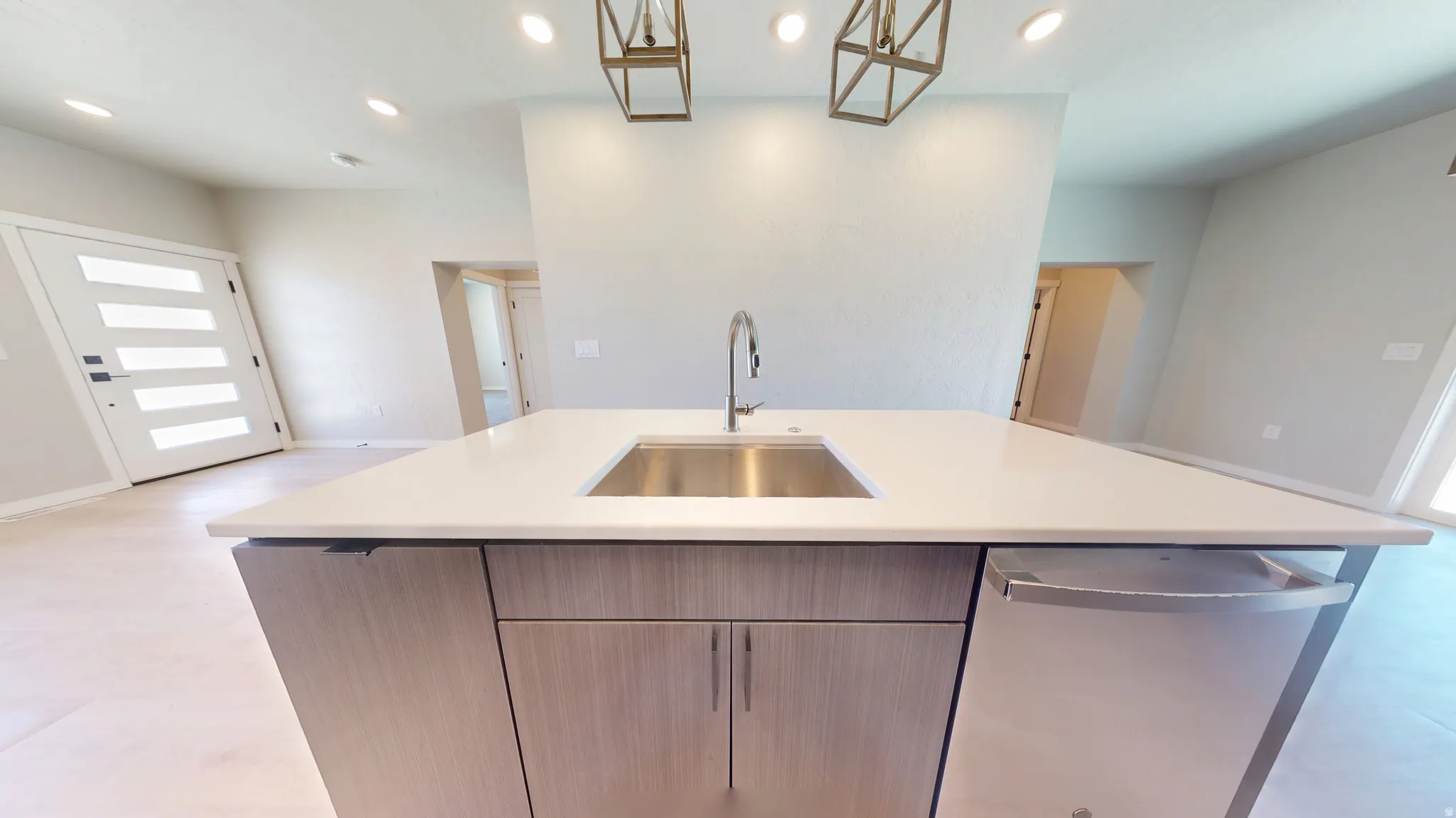 Kitchen with dishwasher, recessed lighting, a kitchen island with sink, hanging light fixtures, and modern cabinets