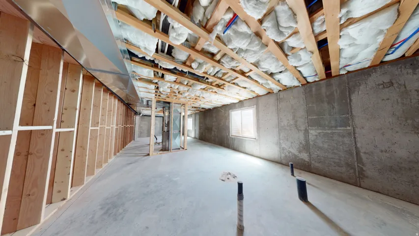 Below grade area featuring heating unit