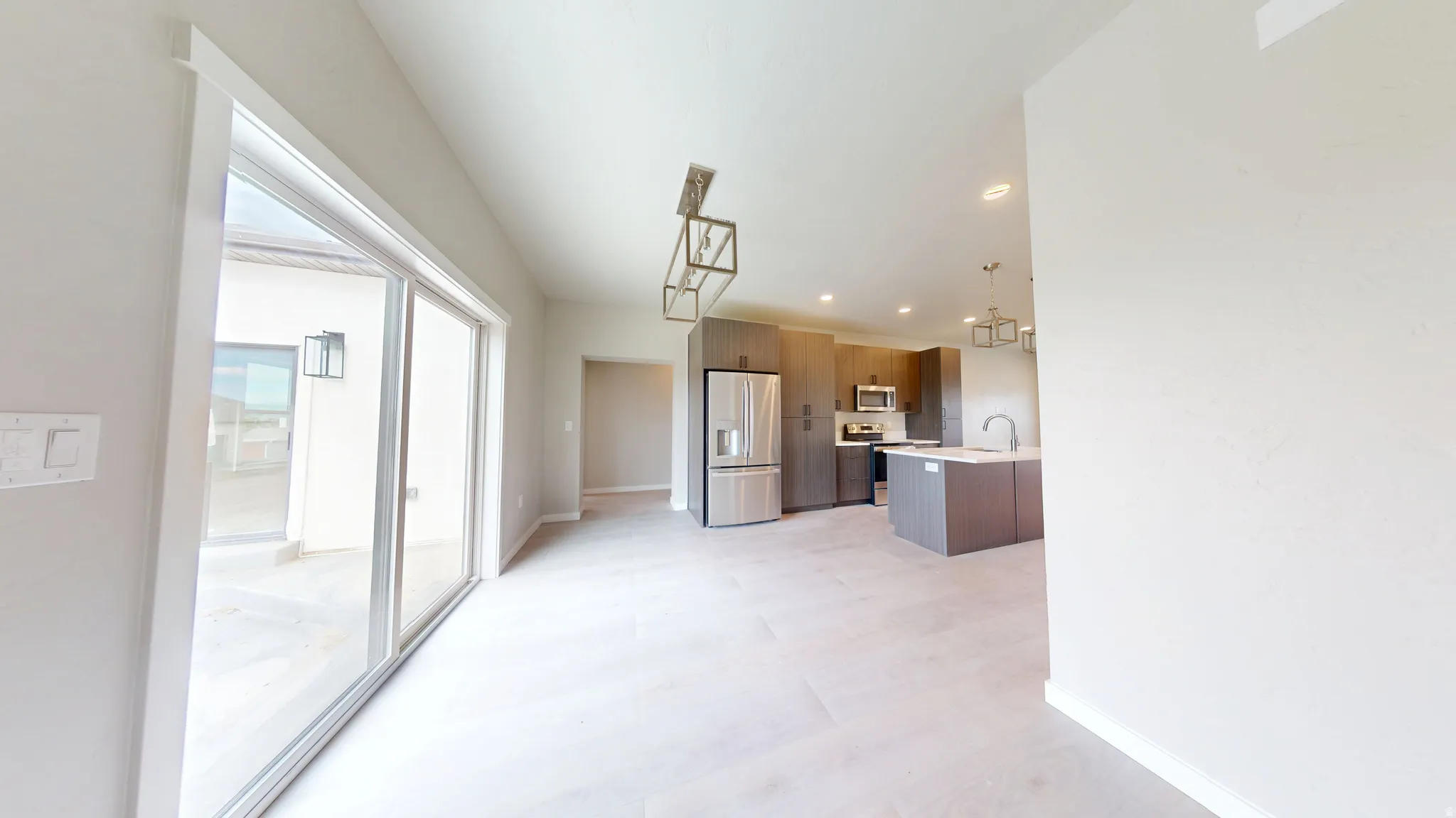 Unfurnished dining area with recessed lighting and light wood-style flooring