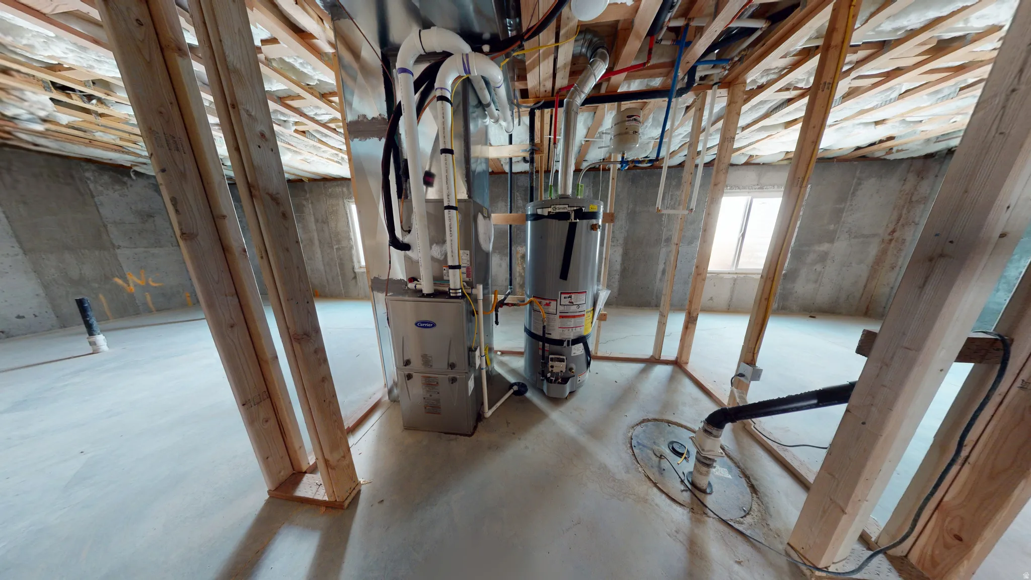 Below grade area with secured water heater and heating unit