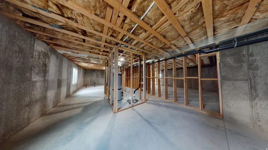Unfinished basement with strapped water heater