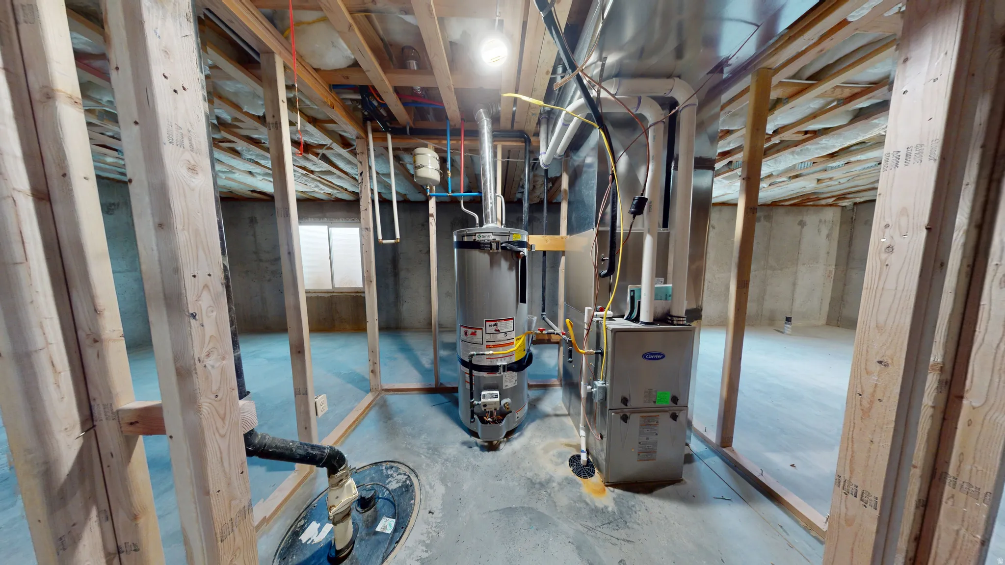 Basement with water heater and heating unit