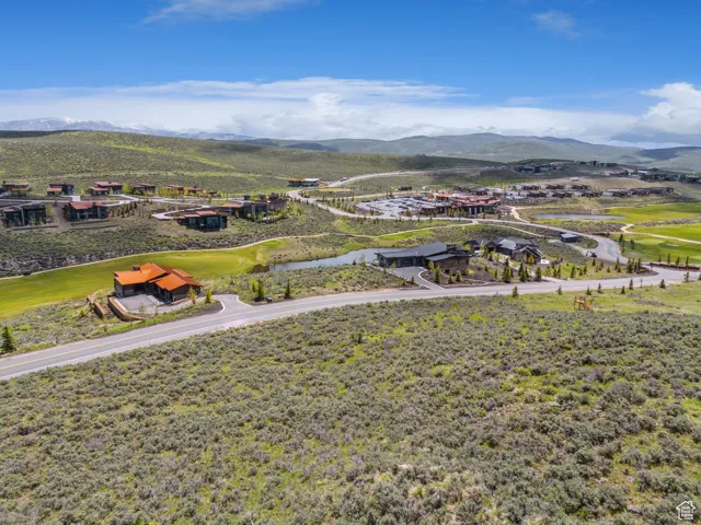 Mountain view with a large body of water and a local golf course