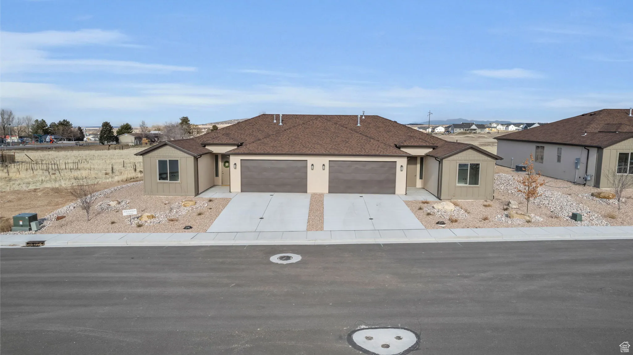 Ranch-style home featuring a garage