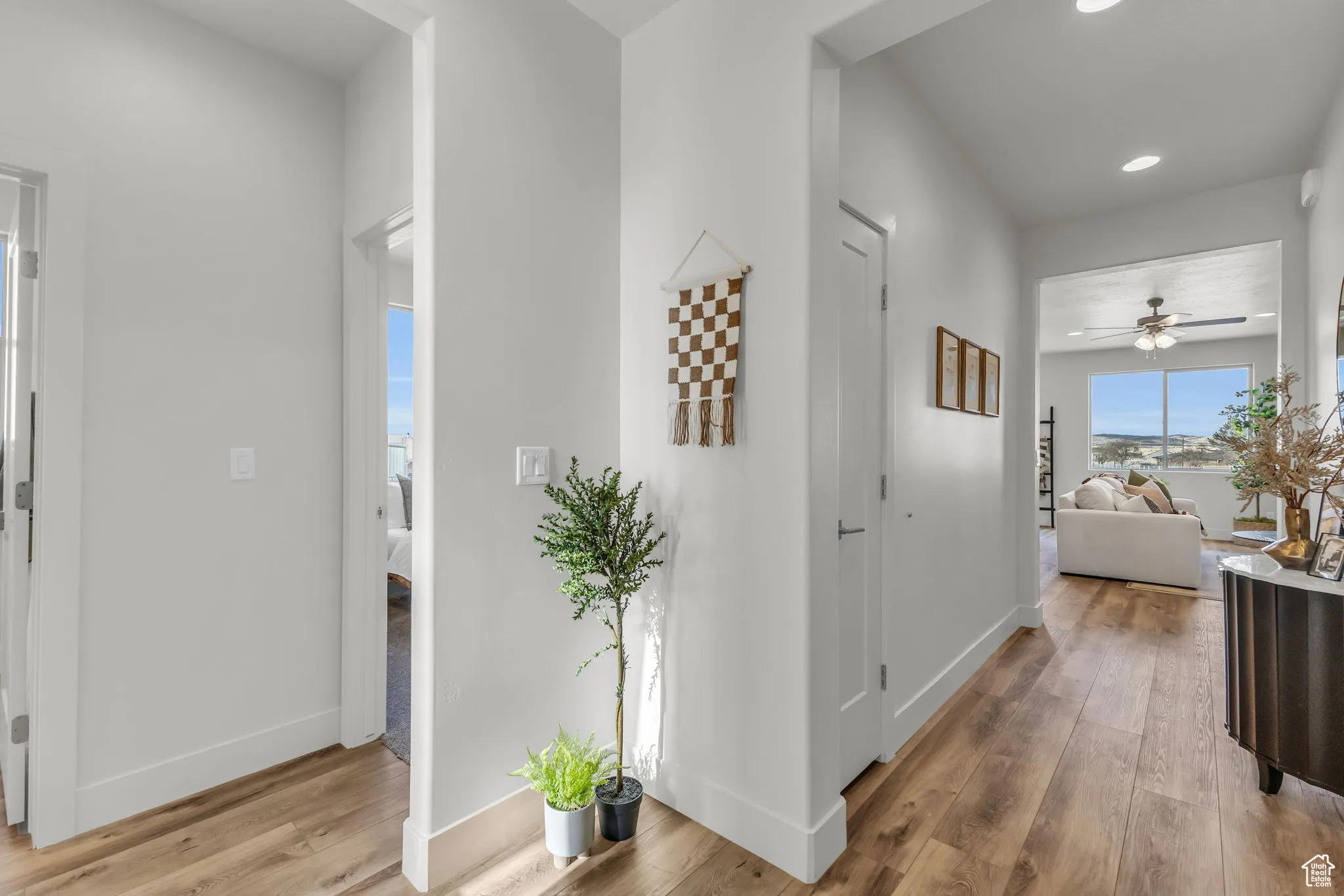 Hallway featuring light hardwood / wood-style flooring
