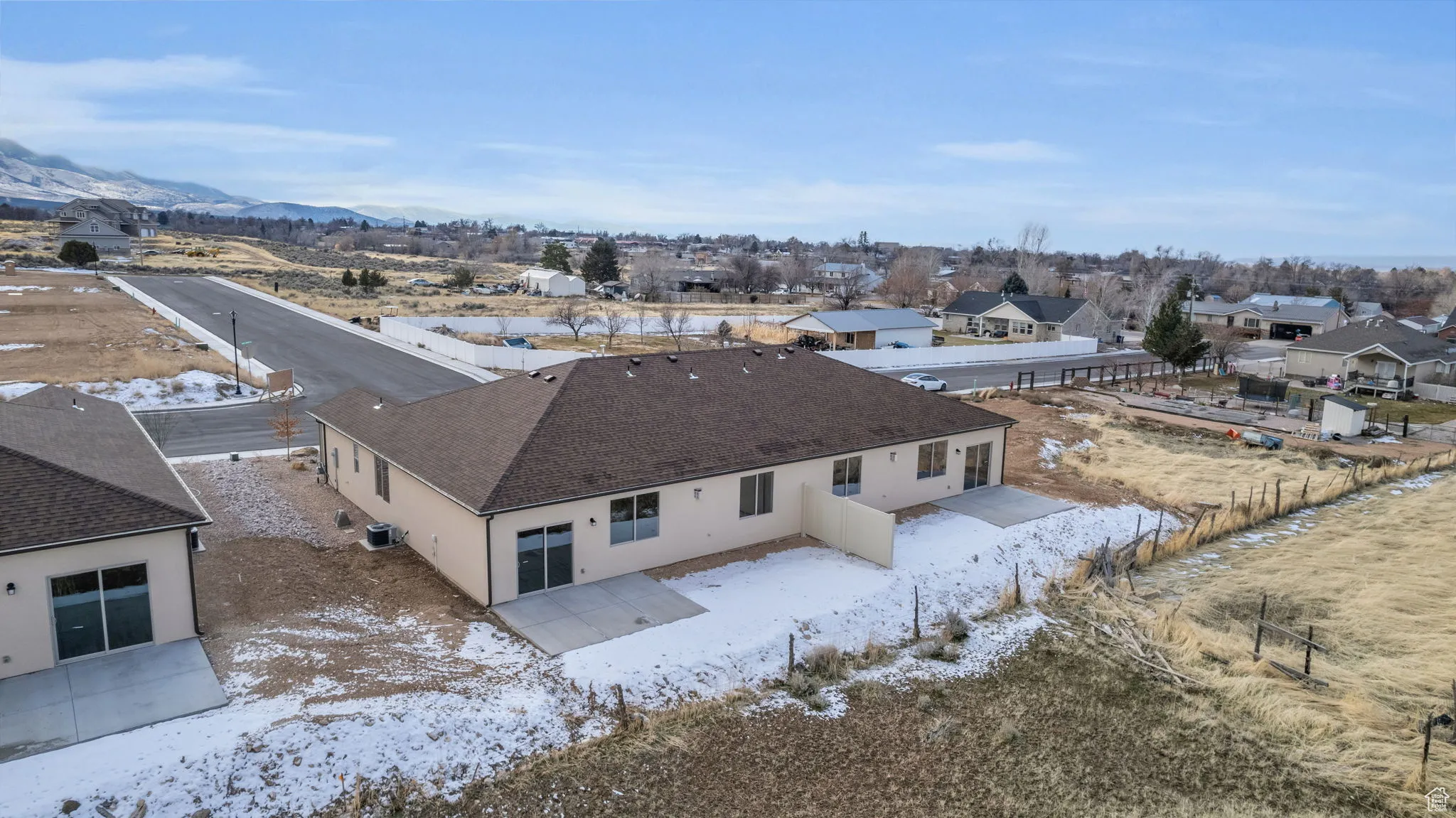 Birds eye view of property with a mountain view