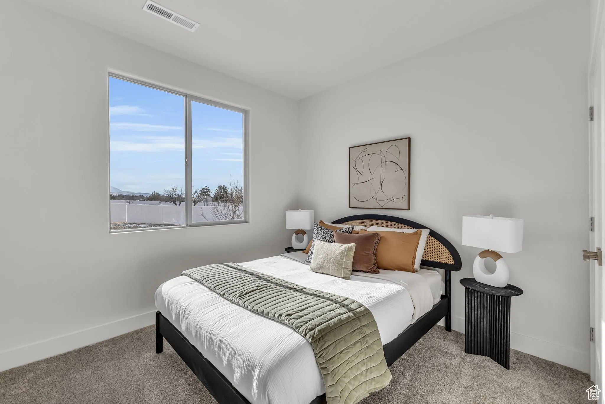 View of carpeted bedroom