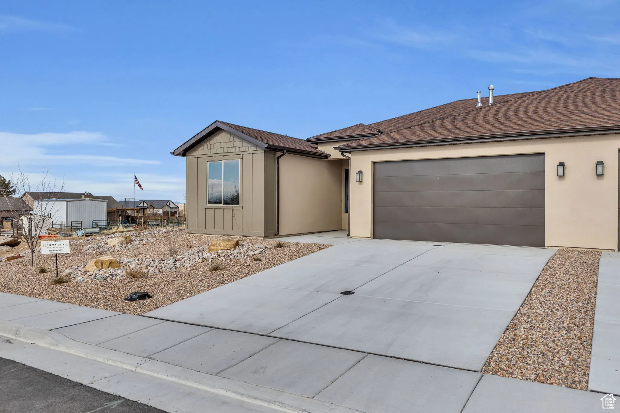 Ranch-style house featuring a garage