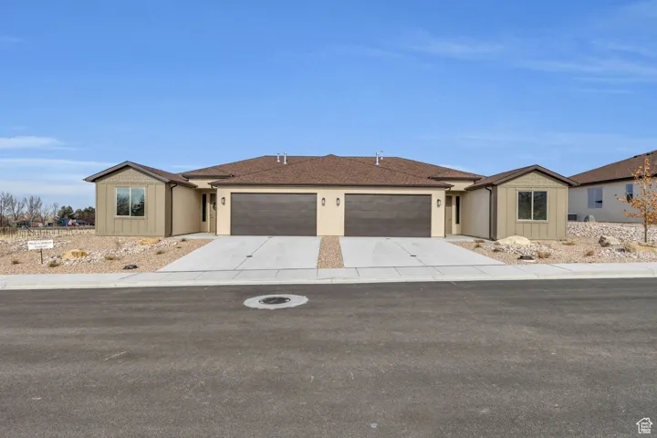 Ranch-style home with a garage